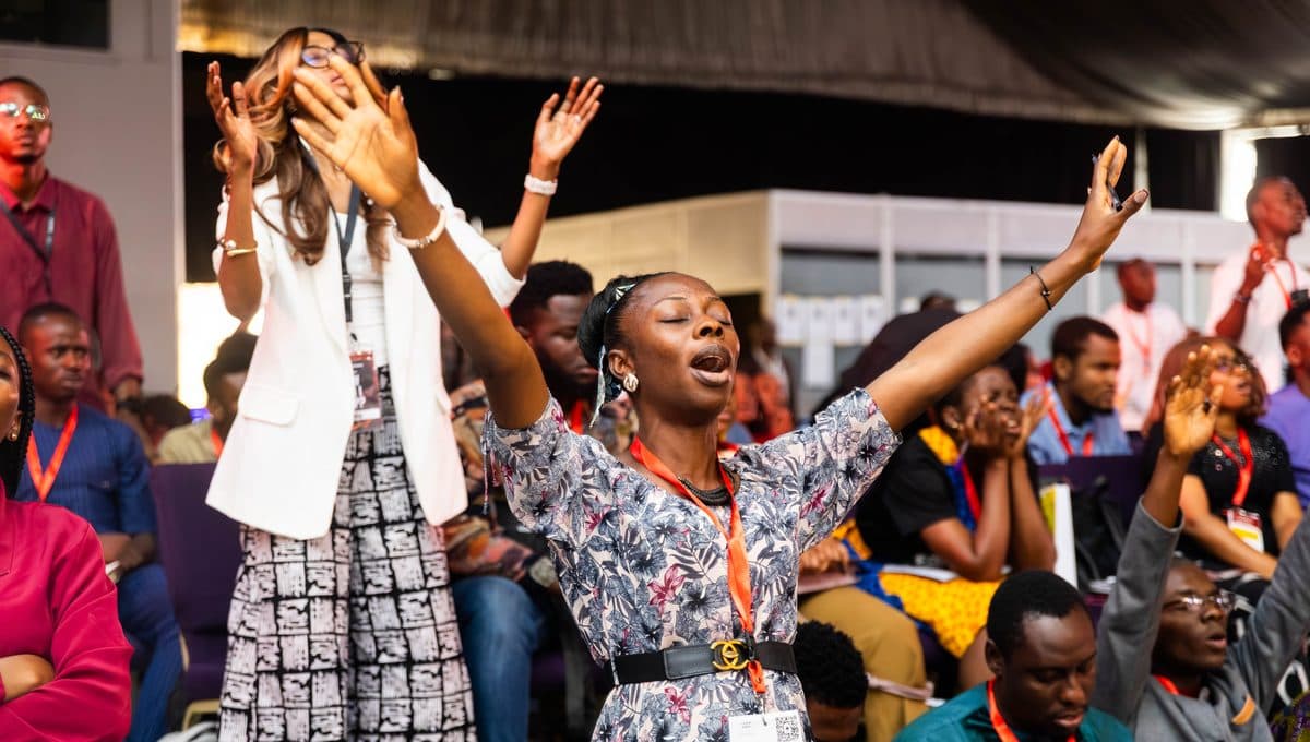 Worship together at a Caleb Dada Ministries camp meeting
