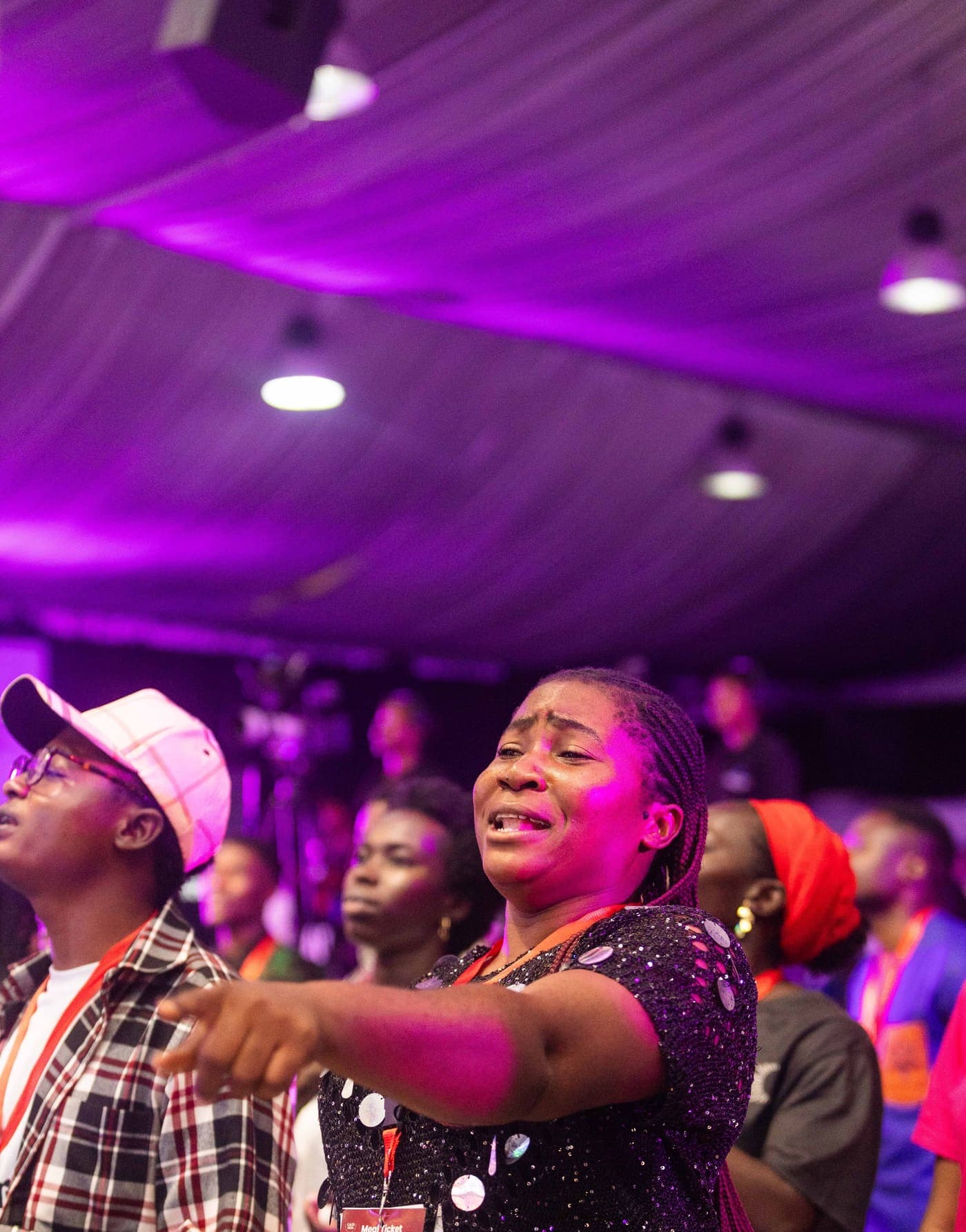 Worship and prayer at a Caleb Dada Ministries camp meeting