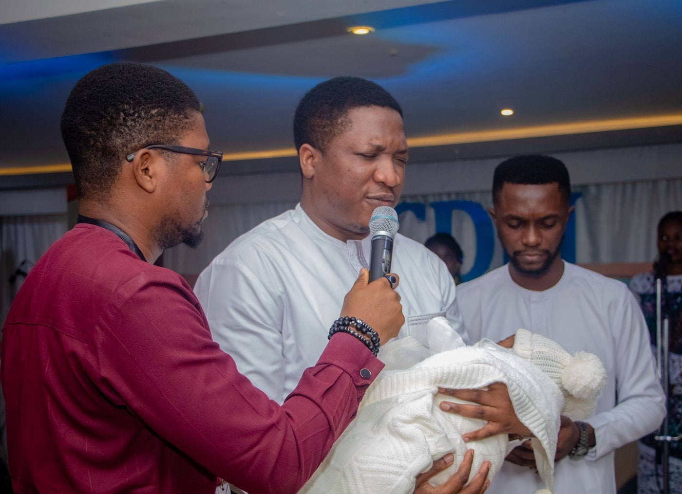 Baby dedication at a CDM family celebration